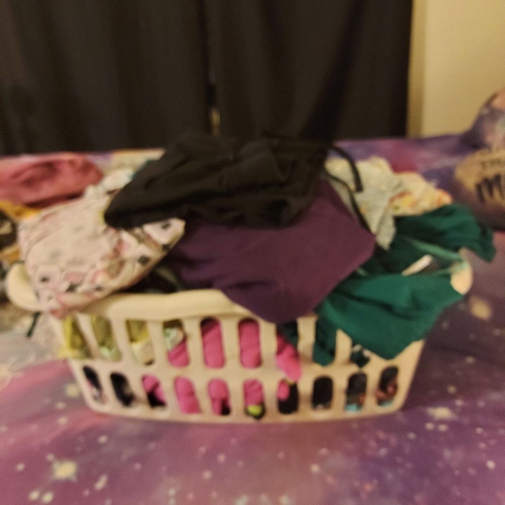 Basket full of scrubs range from Med - XLg